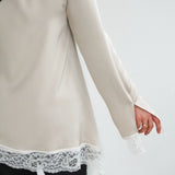 Haut à dentelle beige